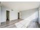 Large bedroom with gray laminate flooring and ensuite bath at 745 N Royal Crest Cir # 141, Las Vegas, NV 89169