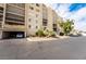Exterior view of the multi-story building with mature landscaping at 745 N Royal Crest Cir # 141, Las Vegas, NV 89169