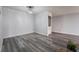 Open dining area featuring gray wood floors and a built-in wet bar at 745 N Royal Crest Cir # 141, Las Vegas, NV 89169