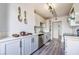 Modern kitchen with stainless steel appliances, gray cabinets, and updated countertops at 745 N Royal Crest Cir # 141, Las Vegas, NV 89169