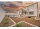 Exterior view of the house showcasing a pool, spa, pergola, patio, and landscaping at 7466 Matilda St, Las Vegas, NV 89113