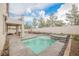 Inviting backyard with a pool, spa, patio, pergola, and landscaped areas at 7466 Matilda St, Las Vegas, NV 89113