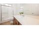 Bathroom featuring a shower, toilet, sink, vanity, and neutral wall and tile colors at 7466 Matilda St, Las Vegas, NV 89113