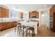 Open kitchen with a large center island, stainless steel appliances, and lots of storage space at 7466 Matilda St, Las Vegas, NV 89113