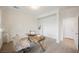 Bright office space with a desk and chair, neutral walls, and carpet flooring at 7466 Matilda St, Las Vegas, NV 89113