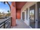 This balcony has sturdy metal railings, tinted privacy screens and sliding glass door at 75 E Agate Ave # 206, Las Vegas, NV 89123