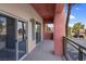 This balcony features sturdy railings and sliding glass doors that open to the outside at 75 E Agate Ave # 206, Las Vegas, NV 89123