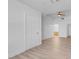 Open and airy bedroom with light wood floors and ensuite bathroom at 75 E Agate Ave # 206, Las Vegas, NV 89123