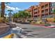 Beautiful community with landscaped entrance and well-maintained buildings with balconies at 75 E Agate Ave # 206, Las Vegas, NV 89123