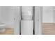 Modern laundry closet with stacked washer and dryer at 75 E Agate Ave # 206, Las Vegas, NV 89123