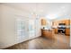 A bright kitchen with stainless appliances and eat-in dining area featuring French doors at 7754 Pink Ginger St, Las Vegas, NV 89123
