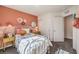 Stylish bedroom featuring colorful decor, a comfortable bed, and modern furnishings at 790 Calm Crystal Ct # Lot 140, North Las Vegas, NV 89081