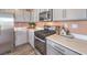 The well-equipped kitchen features stainless steel appliances and a modern design at 790 Calm Crystal Ct # Lot 140, North Las Vegas, NV 89081