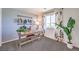 Bright home office features a desk, floral curtains, and a comfortable workspace at 790 Calm Crystal Ct # Lot 140, North Las Vegas, NV 89081