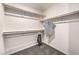 Walk-in closet with neutral carpet and white walls with ample storage space on shelves at 790 Calm Crystal Ct # Lot 140, North Las Vegas, NV 89081