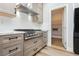 Bright kitchen with a stainless steel oven range and wood-colored cabinets at 8095 Carpenter Creek Ave, Las Vegas, NV 89113