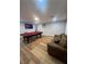 Large living room features a pool table, comfortable seating, and recessed lighting at 8095 Carpenter Creek Ave, Las Vegas, NV 89113