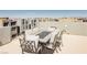 Cozy rooftop patio features comfortable seating and scenic neighborhood views at 8095 Carpenter Creek Ave, Las Vegas, NV 89113