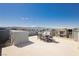 Expansive rooftop patio featuring outdoor dining furniture and panoramic views at 8095 Carpenter Creek Ave, Las Vegas, NV 89113