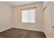 Cozy bedroom with neutral carpet, a window with blinds, and a closet with sliding doors at 8152 Satin Carnation Ln, Las Vegas, NV 89166