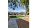 Community dog park features green grass and separate, fenced area for small and large dogs at 9000 Las Vegas Blvd # 1250, Las Vegas, NV 89123