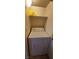 A white clothes dryer in a laundry area with a shelf overhead at 9000 Las Vegas Blvd # 1250, Las Vegas, NV 89123