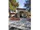 Attractive clubhouse with a stone entryway, arched windows, and beautiful landscaping at 9000 Las Vegas Blvd # 1250, Las Vegas, NV 89123