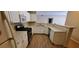 Well-lit kitchen area featuring modern appliances, white cabinetry, and a functional layout at 9000 Las Vegas Blvd # 1250, Las Vegas, NV 89123