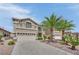 Beautiful two-story home with a well-maintained yard and a three-car garage, showcasing curb appeal at 9046 Barium Rock Ave, Las Vegas, NV 89143