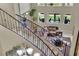 Elegant staircase with decorative iron railings leading to the upper level at 9046 Barium Rock Ave, Las Vegas, NV 89143