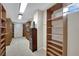 Customizable walk-in closet featuring built-in shelving and ample storage space at 9046 Barium Rock Ave, Las Vegas, NV 89143