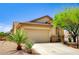 Charming single-story home featuring a two-car garage and desert landscaping at 9137 Big Plantation Ave, Las Vegas, NV 89143