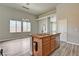 Kitchen island with sink and stainless steel dishwasher in an open-concept living space at 9137 Big Plantation Ave, Las Vegas, NV 89143