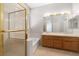 Bathroom with double vanity, tiled shower, and soaking tub at 9282 W Viking Rd, Las Vegas, NV 89147