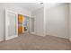 Spacious room featuring carpet and an ensuite bathroom with dual doors for added privacy at 9282 W Viking Rd, Las Vegas, NV 89147
