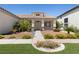 Beautiful single-story home featuring a well-kept lawn and a welcoming front porch at 9282 W Viking Rd, Las Vegas, NV 89147
