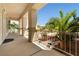 Spacious front porch view with decorative columns and desert landscaping at 9282 W Viking Rd, Las Vegas, NV 89147
