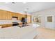 Kitchen featuring wood cabinets, white countertops, and stainless steel sink at 9282 W Viking Rd, Las Vegas, NV 89147