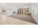 Bright living room featuring a fireplace and built-in bookshelves at 9282 W Viking Rd, Las Vegas, NV 89147