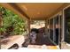 Backyard patio featuring comfortable seating area and outdoor grill at 9513 Perennial View Ave, Las Vegas, NV 89148