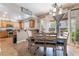 Cozy dining area next to the kitchen with natural light and a view of the backyard at 9513 Perennial View Ave, Las Vegas, NV 89148