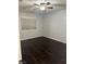 This bedroom features hardwood floors, a ceiling fan, and a bright window at , Henderson, NV 89014