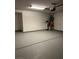 Spacious two-car garage with painted walls, concrete flooring, and ample room for storage at , Henderson, NV 89014