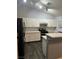 Modern kitchen features white cabinets, sleek appliances, and a stylish counter at , Henderson, NV 89014