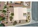 Aerial view showcasing the home's roof and landscaping, surrounded by neighborhood streets at 10301 Coal Creek Pl, Las Vegas, NV 89134