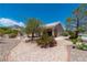 Charming single-story home featuring well-manicured landscaping and a welcoming facade at 10301 Coal Creek Pl, Las Vegas, NV 89134