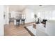 Open floor plan connecting the kitchen, living room, and dining area, creating an inviting and spacious atmosphere at 10301 Coal Creek Pl, Las Vegas, NV 89134