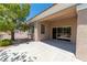 Covered patio with sliding glass doors, seamlessly blending indoor and outdoor living spaces at 10301 Coal Creek Pl, Las Vegas, NV 89134