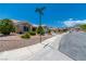 Desirable neighborhood street view with well-maintained homes and desert-friendly landscaping at 10301 Coal Creek Pl, Las Vegas, NV 89134