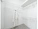 Bright walk-in closet with wire shelving and a plush gray carpet at 10301 Coal Creek Pl, Las Vegas, NV 89134